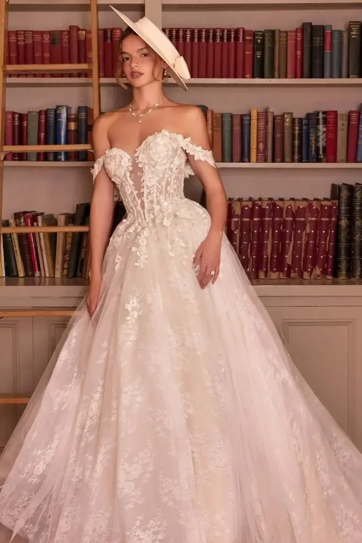 VESTIDO NOVIA HOMBROS CAÍDOS IVORY  APLICACIÓN EN FLORES 3D MOD. WL093