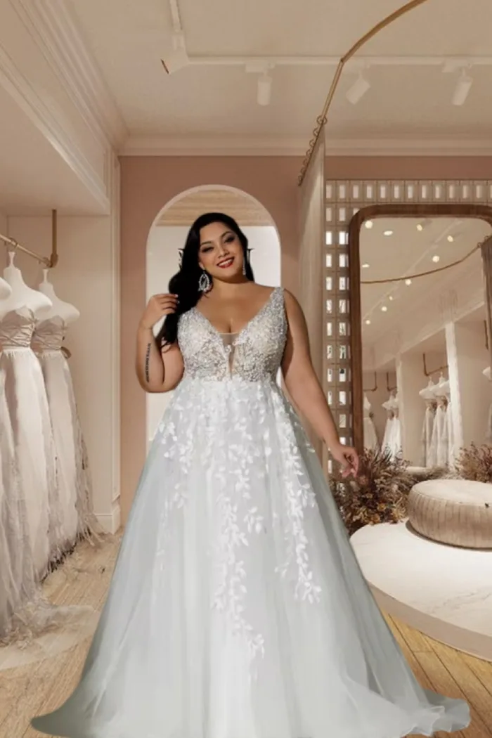 Vestido de novia corte, princesa, bordado en la parte alta con tirante grueso y tul en la falda