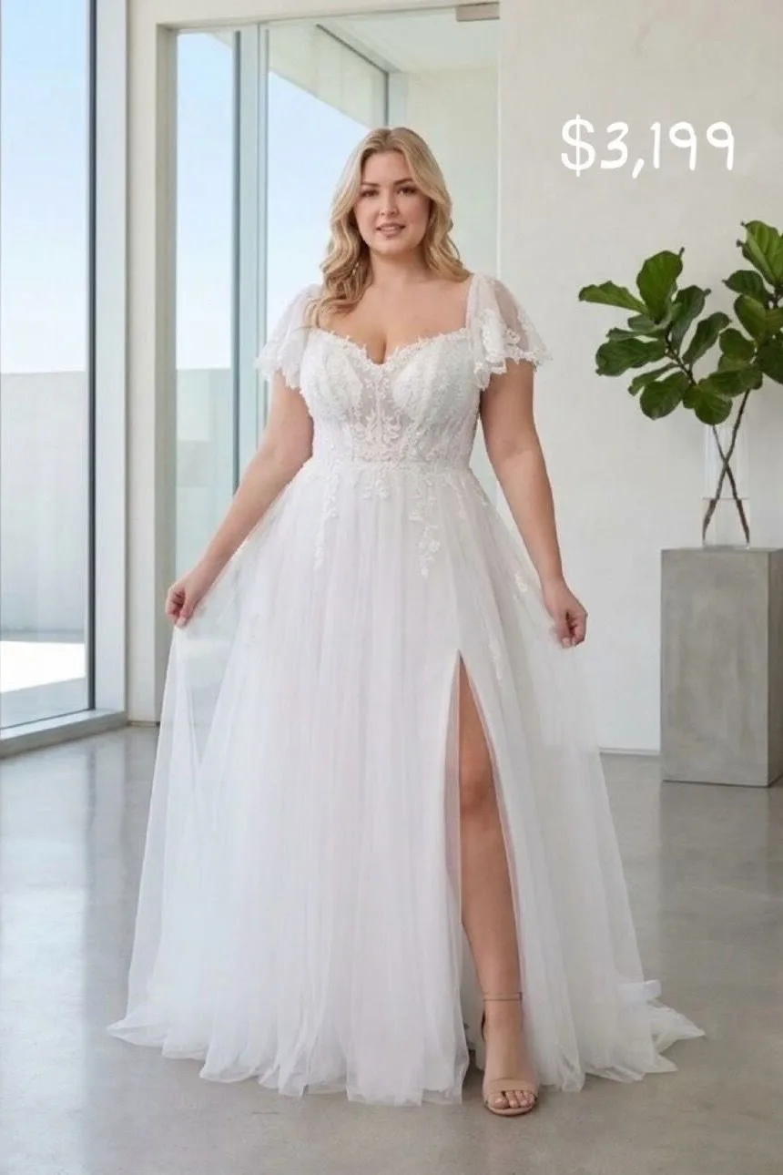 VESTIDO DE NOVIA CON MANGAS CORTAS Y CORSET
